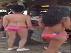 Whoa, those waitresses look hot in bikinis.
